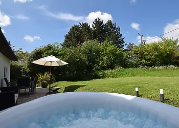 Soak in the Lay-Z-Spa while gazing over the countryside