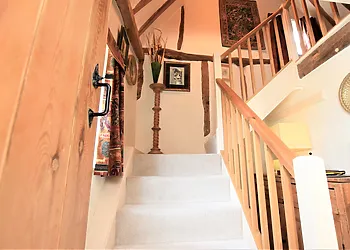 Asending the stairs to the bedroom