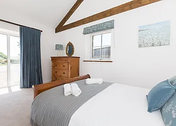 One of the king size bedrooms overlooking the garden