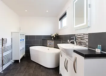 Contemporary bathroom with deep tub