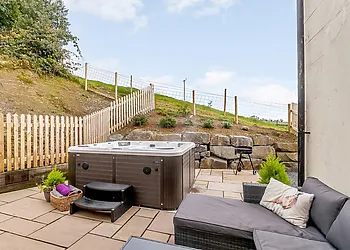 Relax and enjoy the exclusive hot tub