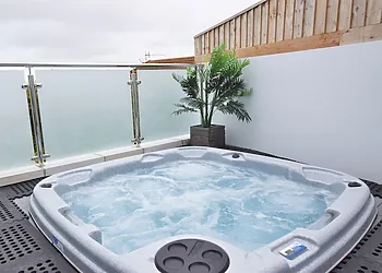 Relax in the sunken hot tub