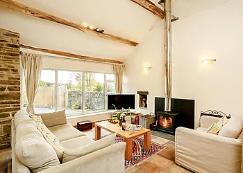 The wood burner enhances the spacious living area