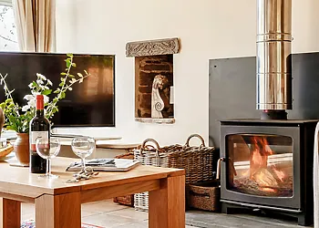 Relax in front of the wood burner after a day out