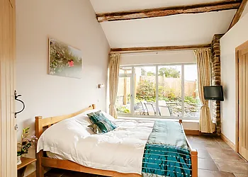 Wake up refreshed in this bright bedroom