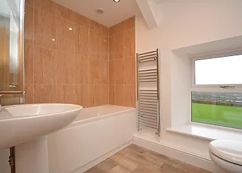 Family bathroom with shower over bath on first floor