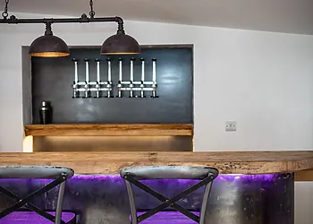 Test your mixology skills at the bar