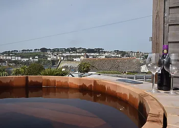Bubble away in the hot tub overlooking the River Fowey