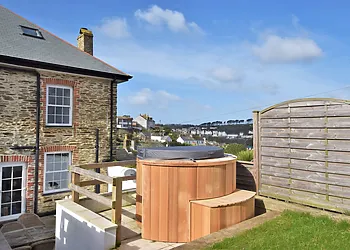 Relax in the hot tub over looking the River Fowey