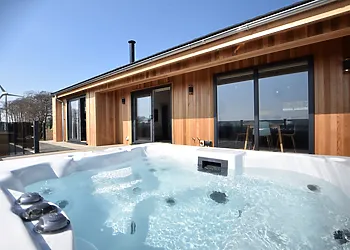 Views towards this amazing stylish lodge with private hot tub to enjoy