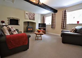 Snug room with a wood burner - ideal for playing board games