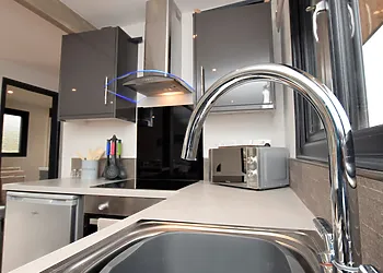 The contemporoary kitchen is well equipped