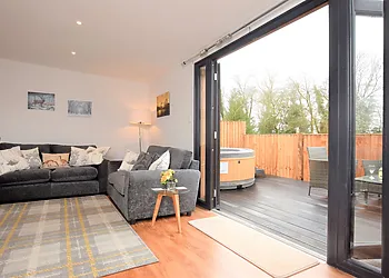 The lounge area opens up onto the private decking