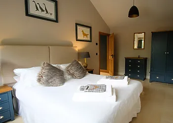 The beautiful large bedroom with superking bed