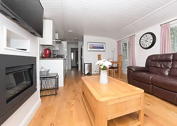 Relax inside this stylish detached lodge