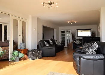 Bi-folding doors from the lounge open up into the garden