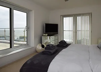 King-size bedroom with dual aspect windows