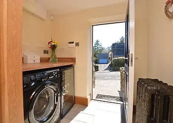 Handy utility room with a drinks fridge