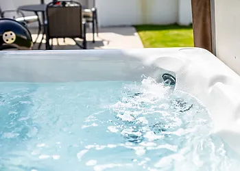 Relax in the hot tub after a long day exploring