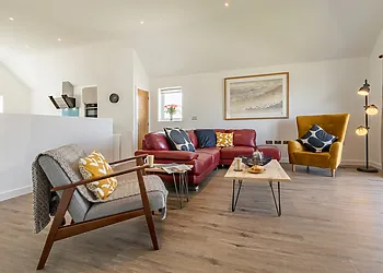 Stunning lounge area with distant sea views