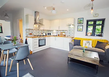 Comfortable lounge space, with a sofa which extends to a bed for an additional person