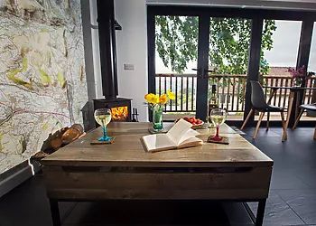 Plan your adventures in front of the wood burner, with a floor to ceiling map to make use of!