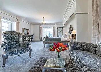 Elegant king-size bedroom furnished to a high standard