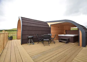 Views towards the lodge with hot tub