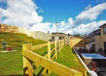 Enjoy the large outside space and fire pit