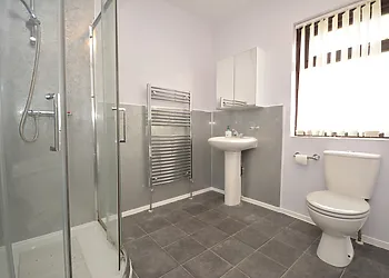 Family bathroom with separate shower