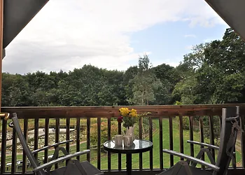 Enjoy a morning coffee on your enclosed balcony