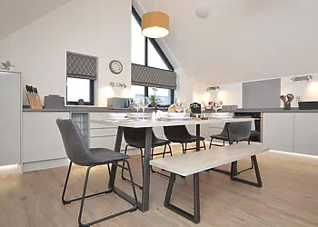 Beautifully appointed kitchen with dining