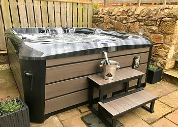 Relax and unwind in the fantastic hot tub