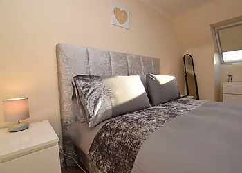 Relax on the comfy bed and enjoy a great movie on the Smart TV