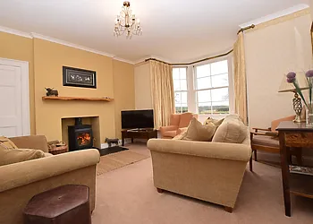 The comfy snug with wood burner, Smart TV and lovely views