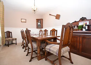 The stylish dining room with ample comfy seating