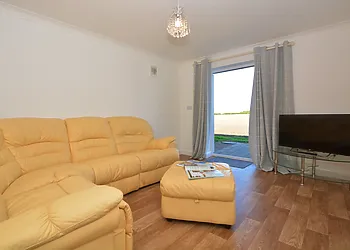 Put your feet up on the reclining sofa