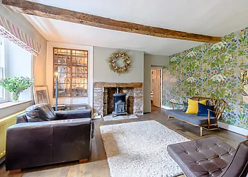 The library -style reception room with wood burner