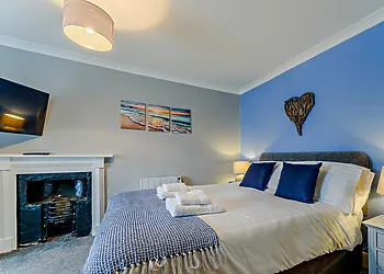 The master double bedroom with a Smart TV