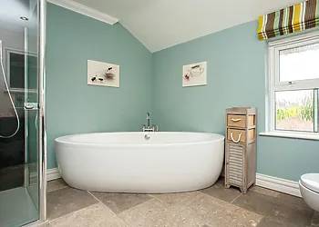 Family bathroom with separate shower