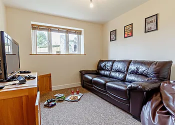 Snug games room with games console 