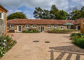 Looking towards the stylish property and annexe from the enclosed courtyard