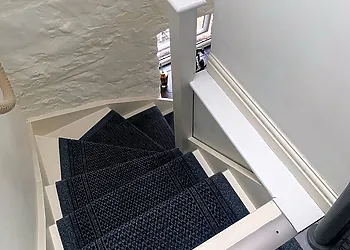 The stairs leads to the first floor of