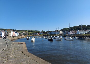 Explore Aberaeron with its harbour and independent shops and eateries