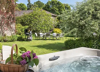 Relax in the private hot tub in the garden