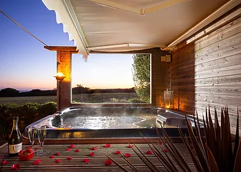 Admire the sunset from the hot tub
