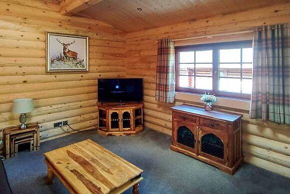 Gingerbread Log Cabin in Felton