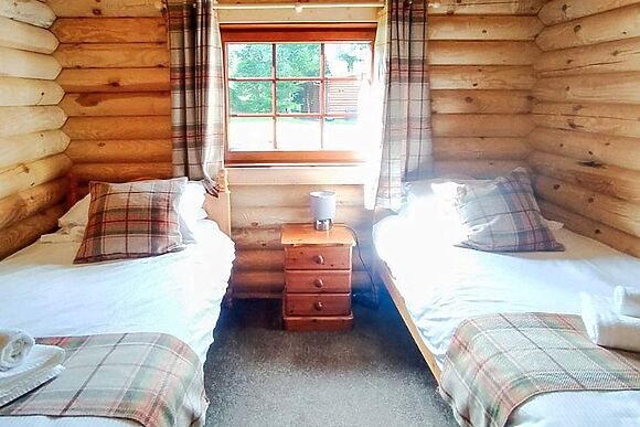 Gingerbread Log Cabin in Felton