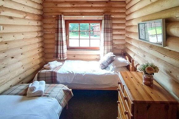 Gingerbread Log Cabin in Felton
