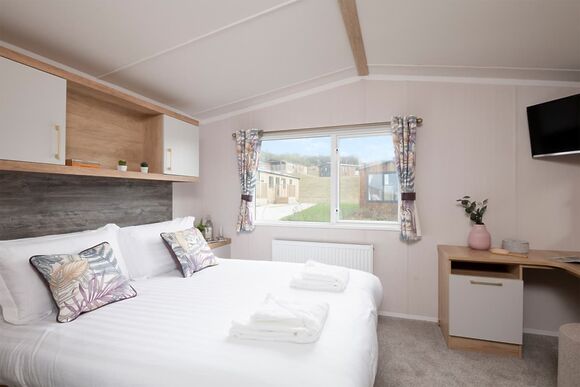 Please note: All imagery shown is a representation only. Style, decor and exact views vary by lodge 